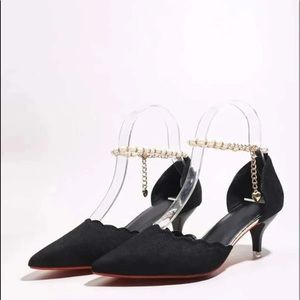 Black elegant heels.